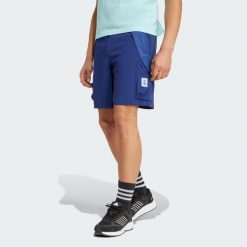 Szorty Arsenal Seasonal Cargo. Niebieskie szorty męskie Adidas, bez wzorów, z materiału, sportowe. Za 279.00 zł.