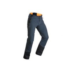 Spodnie turystyczne SH520 X-Warm męskie. Szare spodnie materiałowe męskie QUECHUA, bez wzorów, z elastanu. Za 229.99 zł.