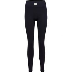 Damskie legginsy Hummel Pulse. Czarne legginsy damskie HUMMEL, bez wzorów, z materiału, na fitness i siłownię. Za 196.00 zł.
