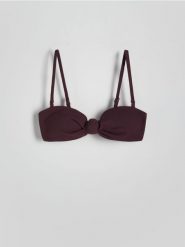 Góra od bikini - ciemnofioletowy. Fioletowe bikini damskie Reserved, bez wzorów. W wyprzedaży za 19.99 zł.