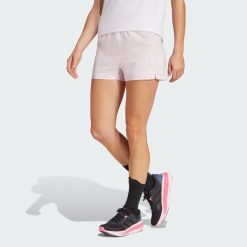 Szorty Own the Run. Zielone spodenki sportowe damskie Adidas, bez wzorów, z materiału, sportowe. Za 179.00 zł.
