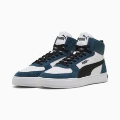 Puma Buty Caven Mid Sd 40179802. Buty sportowe na co dzień męskie Puma, ze skóry, bez zapięcia, na fitness i siłownię. Za 213.99 zł.