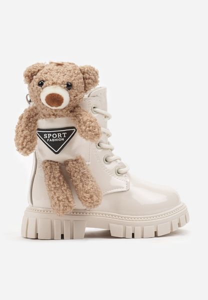 Beżowe Lakierowane Botki Workery na Tłoczonej Podeszwie z Aplikacją Misia w Kieszonce Ivarita. Brązowe botki dziewczęce Born2be, z aplikacjami, z jeansu, bez ramiączek. Za 104.99 zł.