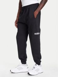 Adidas Spodnie dresowe Essentials Linear Fleece JN1786 Czarny Regular Fit. Czarne spodnie dresowe męskie Adidas, bez wzorów, z bawełny. Za 179.99 zł.