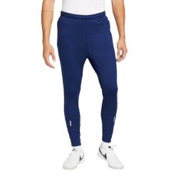 Męskie Spodnie Do Biegania Strike Winter Warrior ThermaFit. Niebieskie spodnie materiałowe męskie Nike, bez wzorów, z materiału. Za 399.99 zł.