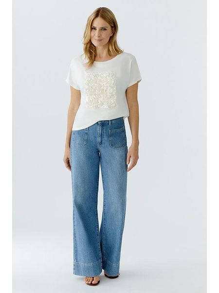 Oui Koszulka w kolorze kremowym rozmiar: 42. Brązowe bluzki damskie Oui, bez wzorów, bez kołnierzyka. Za 152.99 zł.