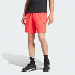 Train Essentials Woven Training Shorts. Czarne szorty sportowe męskie Adidas, uniwersalny, z materiału, na fitness i siłownię. Za 139.00 zł.