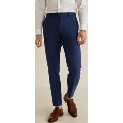 Mango Man - Spodnie Brasilia. Niebieskie spodnie materiałowe męskie Mango Man, bez wzorów, z bawełny, casualowe. W wyprzedaży za 79.90 zł.