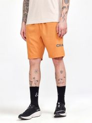 Craft Szorty "Core Essence" w kolorze pomarańczowym do biegania rozmiar: XXL. Pomarańczowe szorty męskie Craft, bez wzorów, z materiału. Za 82.95 zł.