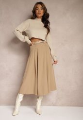 Beżowa Spódnica o Rozkloszowanym Kroju Wykończona w Talii Gumką i Paskiem Evinds. Brązowe spódniczki damskie Renee, l, z aplikacjami, z bawełny, eleganckie, midi, dopasowane. Za 139.99 zł.