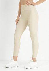 Jasnobeżowe Legginsy Amarhiphae. Brązowe legginsy damskie Born2be, m, z aplikacjami, z dzianiny. Za 49.99 zł.