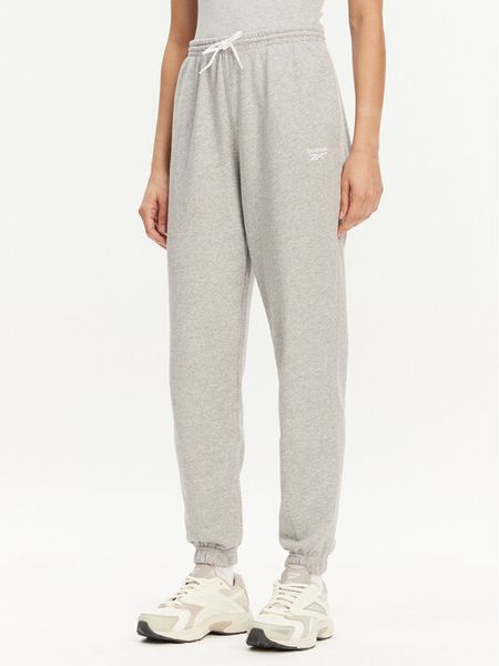 Reebok Spodnie dresowe 100071694 Szary Regular Fit. Szare spodnie dresowe damskie Reebok, xl, bez wzorów, z dresówki. Za 119.99 zł.