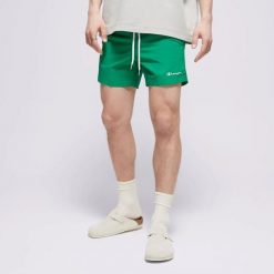 SPODENKI MĘSKIE PLAŻOWE CHAMPION-SZORTY BEACHSHORT ZA KOLANO KOLOR ZIELONY. Zielone szorty męskie CHAMPION, na lato, bez wzorów, z materiału, eleganckie. Za 65.88 zł.