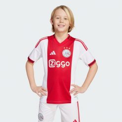 Koszulka podstawowa Ajax Amsterdam 25/26. Białe t-shirty damskie Adidas, l, bez wzorów, z poliesteru, bez kołnierzyka. Za 329.00 zł.