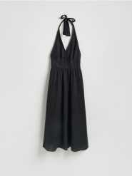 Lniana sukienka midi - czarny. Czarne sukienki damskie Reserved, l, bez wzorów, z tkaniny, bez kołnierzyka, bez ramiączek, midi, rozkloszowane. Za 329.99 zł.
