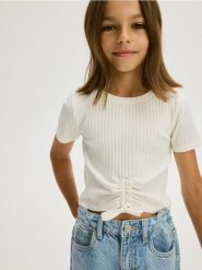 T-shirt ze ściągaczem - złamana biel. Koszulki dziewczęce Reserved, bez wzorów, z bawełny, bez ramiączek. W wyprzedaży za 15.99 zł.