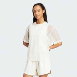 Koszulka Soft Lux Mesh. Białe bluzki damskie Adidas, xl, bez wzorów, z meshu, bez ramiączek. Za 179.00 zł.