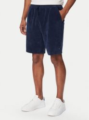 Tommy Hilfiger Szorty sportowe MW0MW42880 Granatowy Regular Fit. Niebieskie szorty męskie Tommy Hilfiger, bez wzorów, z bawełny, sportowe. Za 489.99 zł.