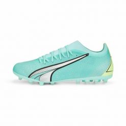 Buty sportowe dla dorosłych do gry w piłkę Ultra Match Mg. Zielone buty sportowe na co dzień damskie Puma, bez wzorów, z materiału. Za 256.65 zł.