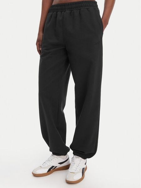 Reebok Spodnie dresowe Reebok x Ewa Chodakowska RK25621CCW Czarny Relaxed Fit. Czarne spodnie dresowe damskie Reebok, s, bez wzorów, z bawełny. Za 199.99 zł.