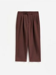 Spodnie wide leg z wiskozą - brązowy. Brązowe spodnie materiałowe męskie Reserved, bez wzorów, z tkaniny. Za 179.99 zł.