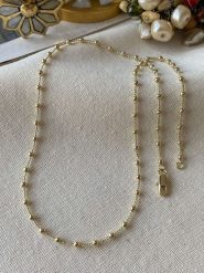 Luseera Pozłacany naszyjnik z elementami ozdobnymi - dł. 45 cm rozmiar: onesize. Żółte naszyjniki damskie Luseera, pozłacane. Za 43.99 zł.