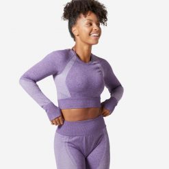 Koszulka fitness damska Domyos długi rękaw. Niebieskie bluzki sportowe damskie DOMYOS, l, bez wzorów, z materiału, bez kołnierzyka. Za 69.99 zł.