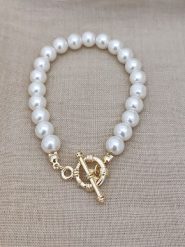 Nakkash Pozłacana bransoletka ze szklanymi koralikami rozmiar: onesize. Białe bransoletki damskie Nakkash, pozłacane. Za 34.99 zł.