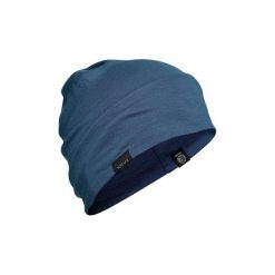 Czapka trekkingowa TREK 500 WOOL. Niebieskie czapki męskie FORCLAZ, bez wzorów, z materiału. Za 39.99 zł.