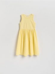 Bawełniana sukienka - jasnożółty. Żółte sukienki dziewczęce Reserved, bez wzorów, z bawełny, bez ramiączek. Za 79.99 zł.