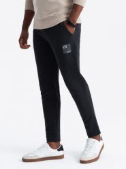 Męskie spodnie dresowe z logotypem – czarne V1 OM-PASK-0167 - XXL. Czarne spodnie dresowe męskie Ombre Clothing, bez wzorów, z bawełny. Za 131.99 zł.