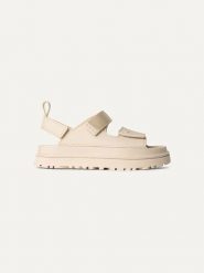UGG Sandały "Goldenglow" w kolorze kremowym rozmiar: 39. Brązowe sandały damskie Ugg, bez wzorów, bez obcasa, na koturnie. Za 461.21 zł.