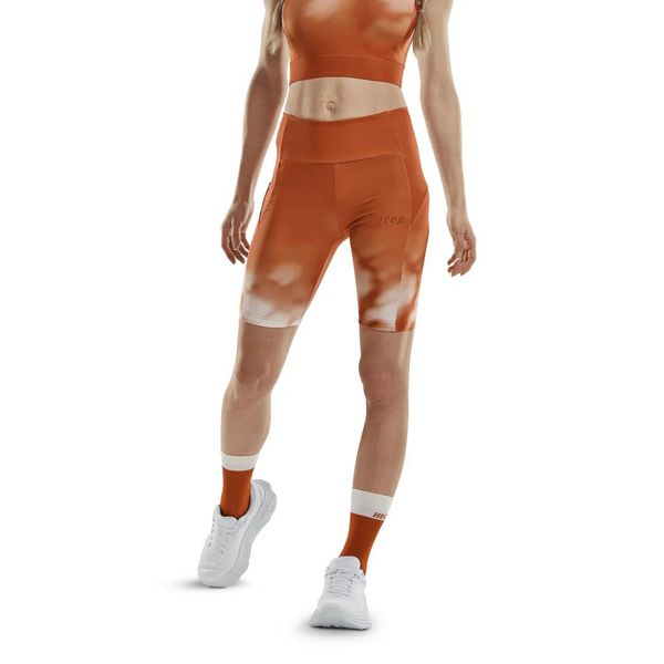 Krótkie szorty sportowe do biegania CEP limitowana kolekcja Bloom damskie. Białe spodenki sportowe damskie CEP, l, z elastanu, do biegania. Za 199.00 zł.