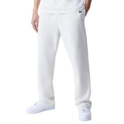 Spodnie do biegania New Era Essentials. Szare spodnie materiałowe męskie New Era, bez wzorów, z dresówki. Za 276.50 zł.