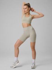 4F Legginsy kolarki treningowe bezszwowe damskie - beżowe XL/XXL. Brązowe legginsy damskie 4f, l, bez wzorów. Za 99.99 zł.