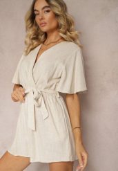 Beżowy Kopertowy Kombinezon z Bawełny Wiązany w Talii Materiałowym Paskiem Vikly. Brązowe kombinezony damskie Renee, l, bez wzorów, z bawełny, eleganckie, bez kołnierzyka, bez ramiączek. Za 69.99 zł.