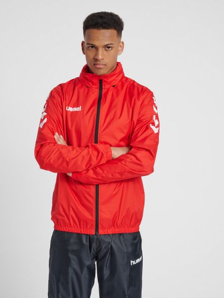 Kurtka ortalionowa sportowa dla dorosłych Hummel Core Spray Jacket. Czerwone kurtki treningowe męskie HUMMEL, l, bez wzorów, z materiału, na fitness i siłownię. Za 80.00 zł.