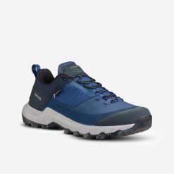 Buty turystyczne męskie Quechua MH500 wodoodporne. Niebieskie buty trekkingowe męskie QUECHUA, z kauczuku, bez zapięcia, trekkingowe. Za 299.99 zł.