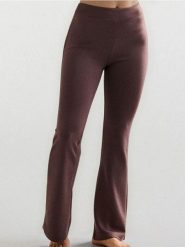 Spodnie flare z dzianiny scuba Gym Hard - brązowy. Brązowe spodnie materiałowe damskie Sinsay, bez wzorów, z dzianiny. Za 39.99 zł.