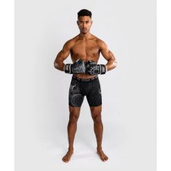 Venum Spodenki Vale Tudo Gladiator 5.0 Czarno-srebrne. Czarne szorty męskie VENUM, bez wzorów, sportowe. Za 199.00 zł.