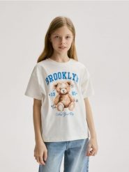T-shirt z nadrukiem - złamana biel. Koszulki dziewczęce Reserved, bez wzorów, z bawełny, bez ramiączek. W wyprzedaży za 22.99 zł.