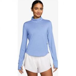 Koszulka treningowa damska Nike HQ0499468ALUMINUMRE. Niebieskie bluzki sportowe damskie Nike, l, bez wzorów, bez kołnierzyka. Za 462.00 zł.