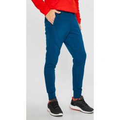 Adidas Performance - Spodnie. Niebieskie spodnie sportowe męskie adidas Performance, z dzianiny. W wyprzedaży za 139.90 zł.