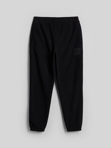 4F Spodnie polarowe joggery męskie - czarne M. Czarne spodnie dresowe męskie 4f, bez wzorów, z dresówki. Za 149.99 zł.