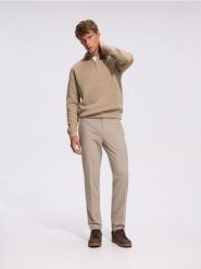 Spodnie chino slim z kantem - beżowy. Brązowe spodnie materiałowe męskie Reserved, bez wzorów, z tkaniny. Za 159.99 zł.
