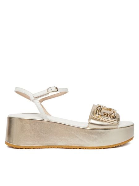 Liu Jo Sandały Flo 01 SA6137 PX026 Złoty. Żółte sandały damskie Liu Jo, bez wzorów, ze skóry, bez obcasa, na koturnie. Za 599.99 zł.