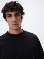 T-shirt boxy - czarny. Czarne t-shirty męskie Reserved, l, bez wzorów, z bawełny, bez kołnierzyka. Za 69.99 zł.