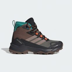 Buty trekkingowe Terrex Skychaser AX5 Mid GORE-TEX CLIMAWARM+. Brązowe obuwie trekkingowe damskie Adidas. Za 699.00 zł.