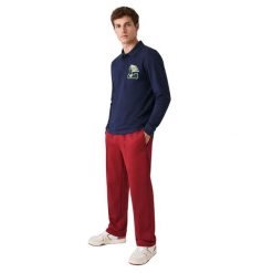 Koszulka sportowa polo męska Lacoste Polo. Niebieskie koszulki polo męskie Lacoste, l, z aplikacjami, z bawełny, bez ramiączek. Za 327.00 zł.