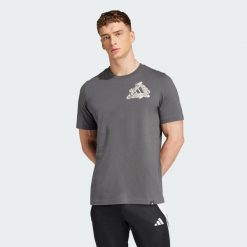 Koszulka Football Kicks Graphic. Szare t-shirty sportowe męskie Adidas, s, bez ramiączek, do piłki nożnej. W wyprzedaży za 77.40 zł.
